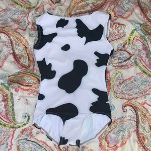 Lucky leo! So cute cow print, Allure size L